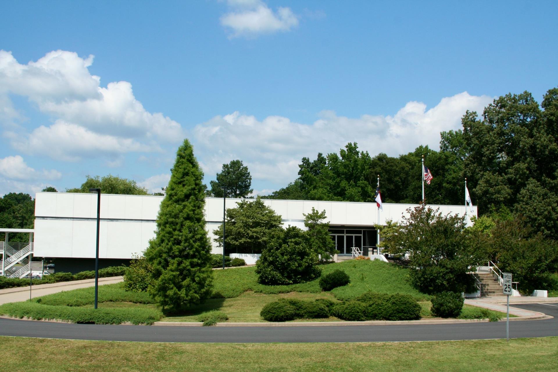 A photo of Eden City Hall with a blue sky overhead.  